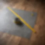 Measuring tape on a floor plan