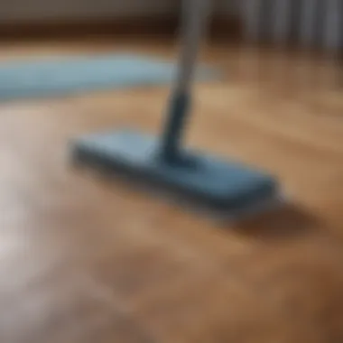 Essential Cleaning Tools Essential tools for maintaining laminate floors, including a microfiber mop and vinegar